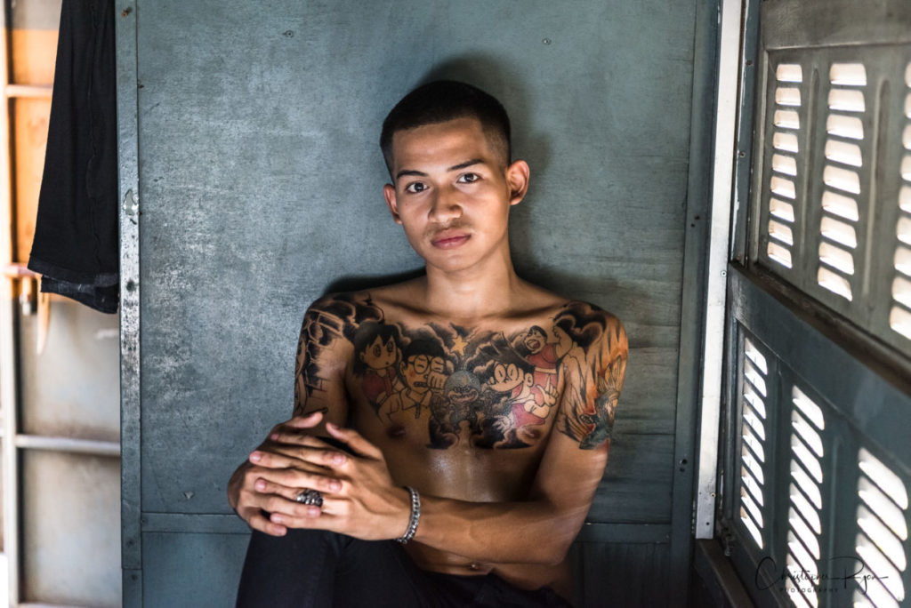 sexy shirtless teenager with tattoos
