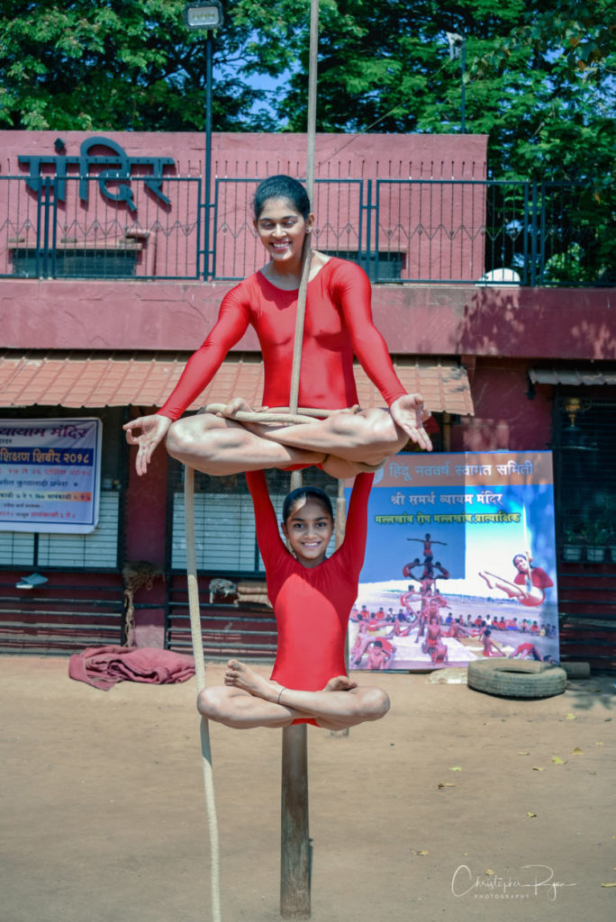 Aditi Karambelkar, age 18 & Grishma Desai 9 performing pyramid of Padmasan & Hanging Padmasan on Rope Mallakhamb